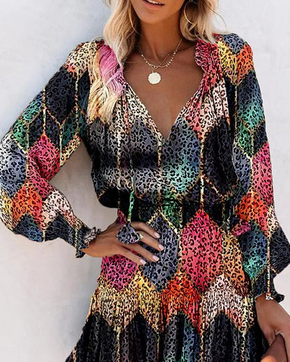 Flirty Floral Mini Patchwork Dress – Long Sleeve V-Neck Ruffle Waist for Springtime Charm